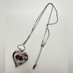 NIB Sterling silver, possibly gold plated, heart necklace with cz diamonds!